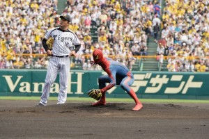 Spiderman throws out the first pitch at a Hanshin Tigers game.